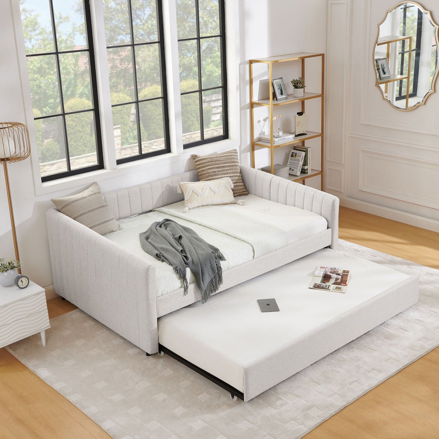 Beige full-size upholstered daybed with pull-out trundle
