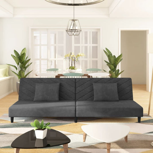 Dark gray velvet 2-seater sofa bed with pillows