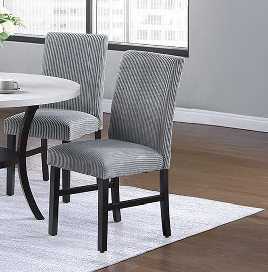 Modern dining chairs with textured fabric and solid wood frame