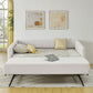 Beige full-size upholstered daybed with pull-out trundle