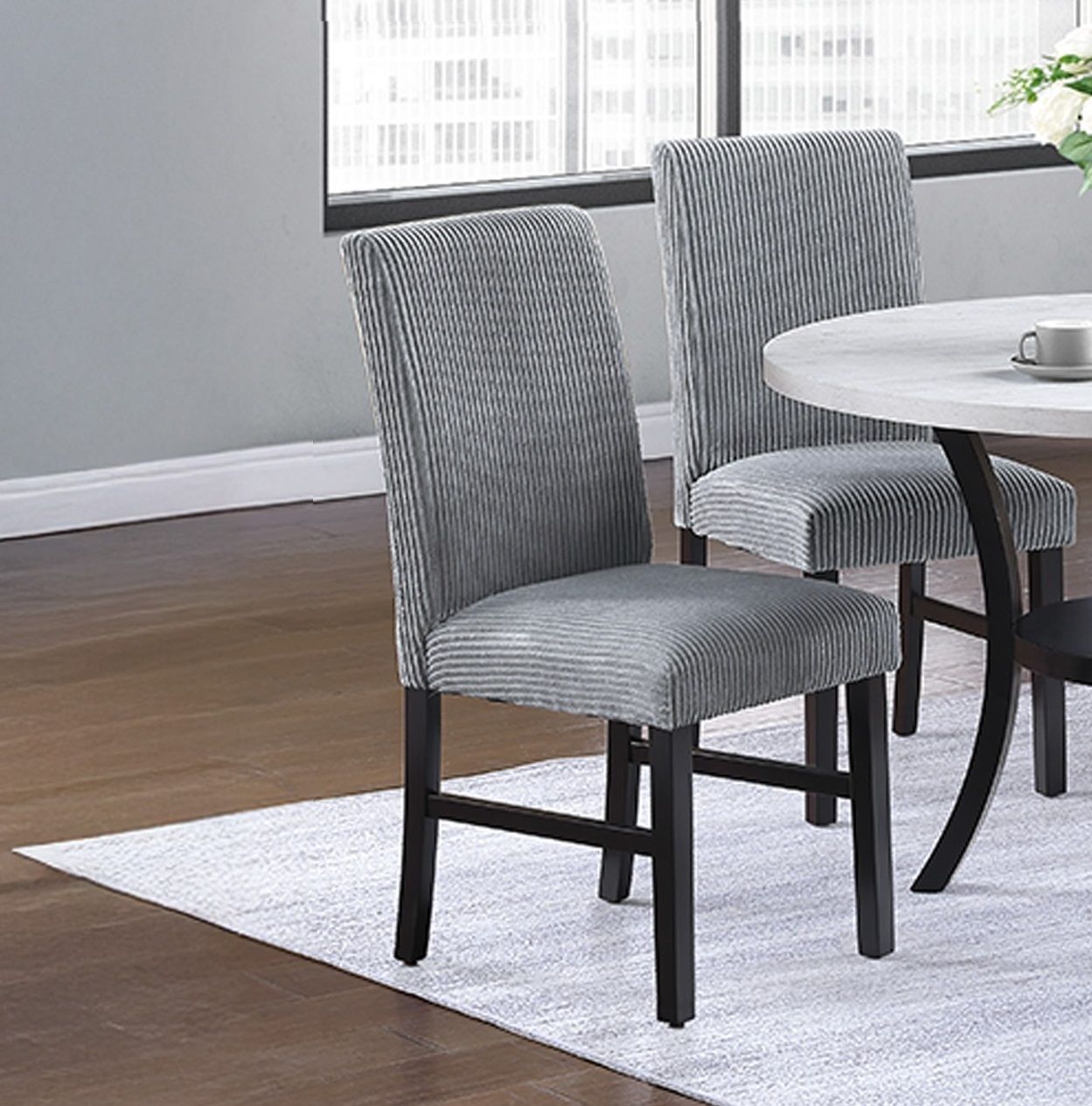 Modern dining chairs with textured fabric and solid wood frame