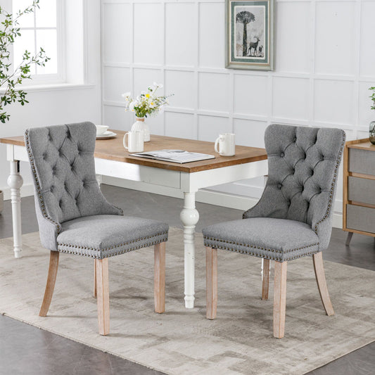 Tufted flax upholstered dining chair with nailhead trim