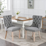 Tufted flax upholstered dining chair with nailhead trim