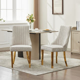 Modern upholstered dining chair with gold stainless legs