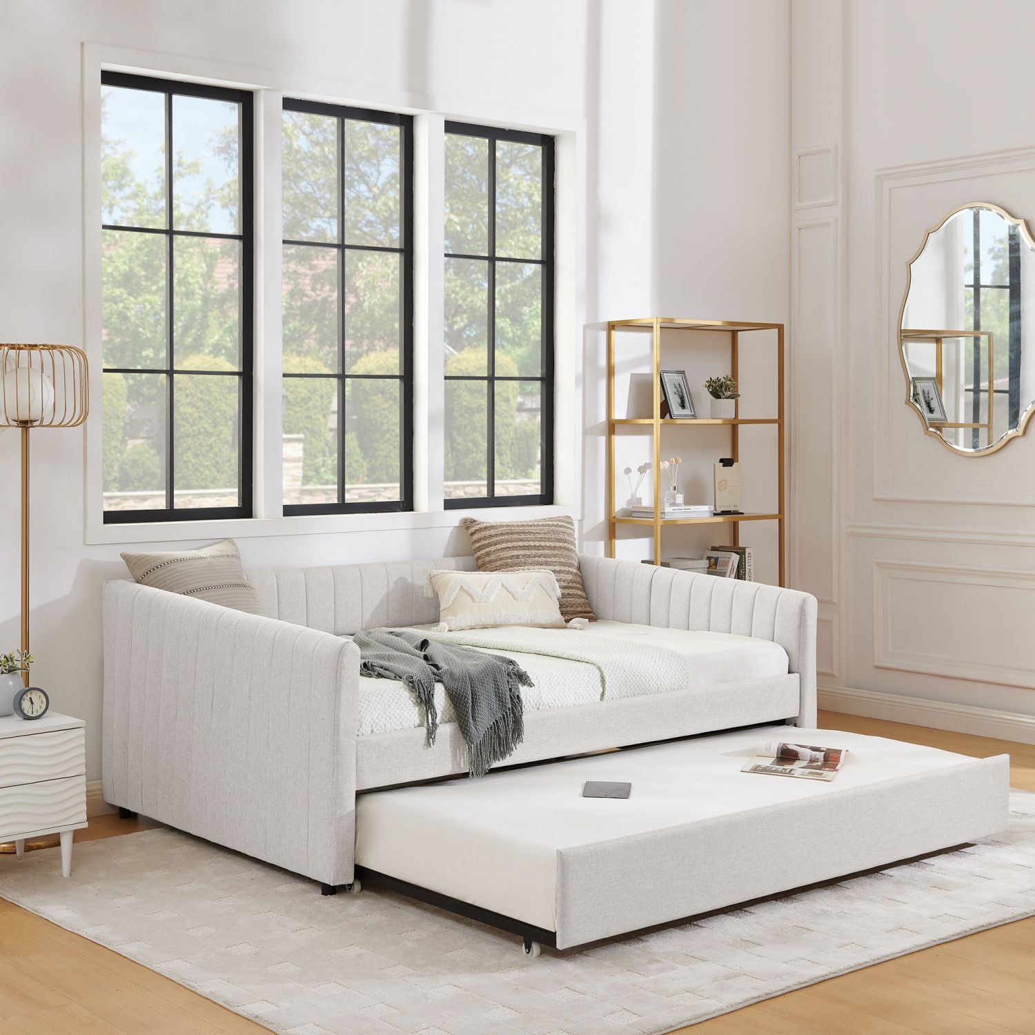 Beige full-size upholstered daybed with pull-out trundle