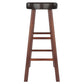 Wooden bar stool set with crossbar footrests and cushioned top